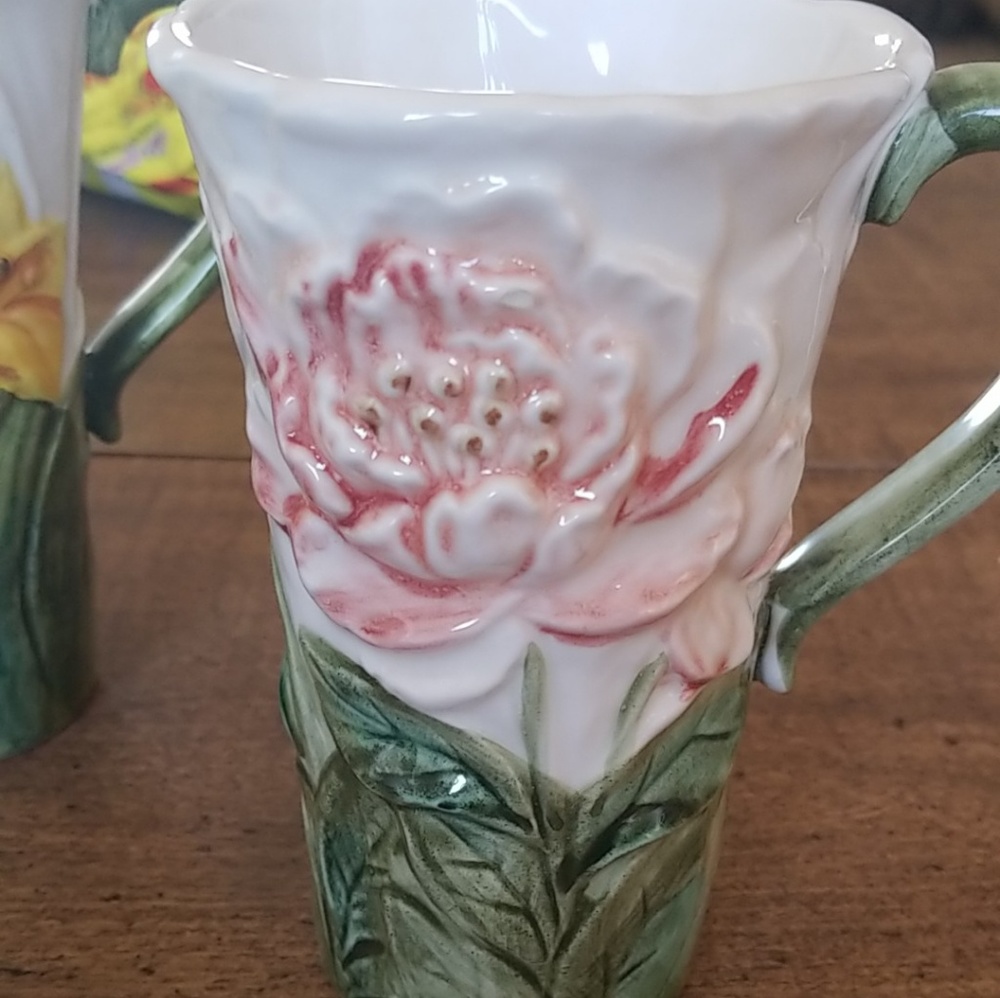 Vintage chocolate mugs or coffee mugs with wild ro